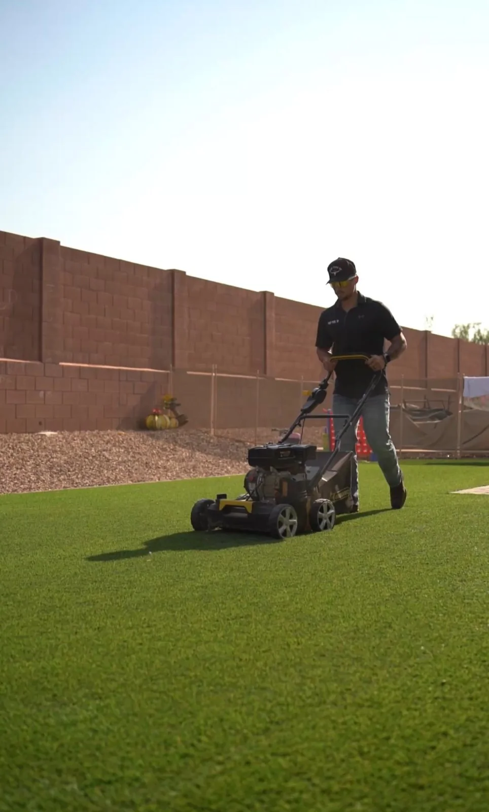 Power brooming artificial turf in the East Valley