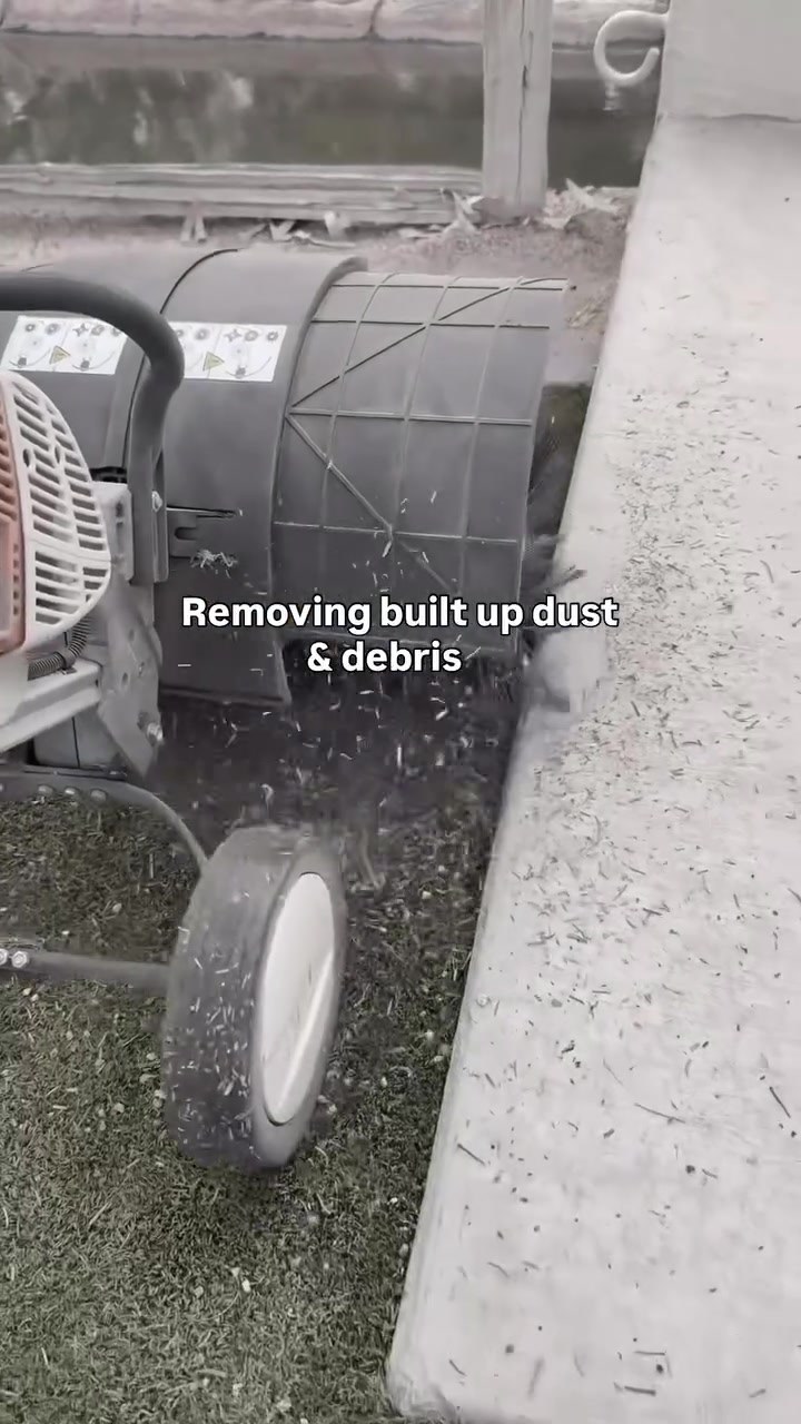 Power brooming built-up dust and debris from wedding venue artificial turf in Phoenix, AZ - Turf Tune Up