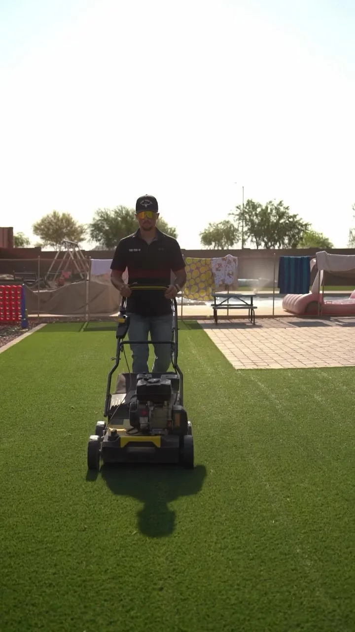 Turf Tune Up power brooming a residential artificial turf lawn